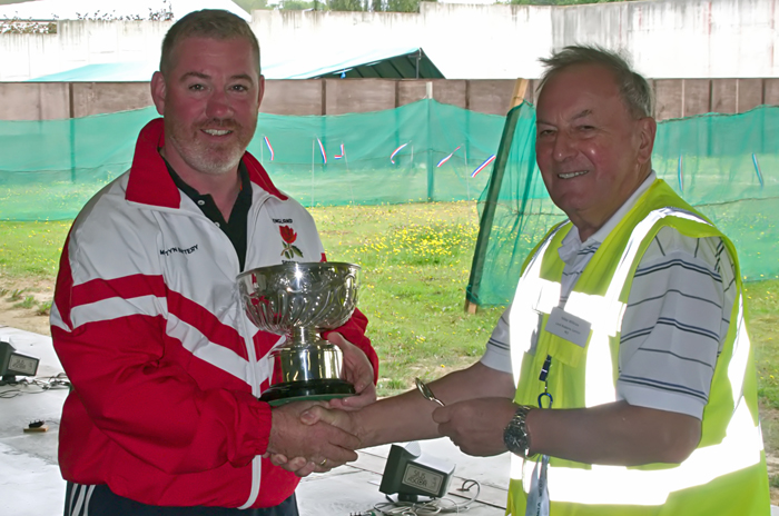 Photograph shows Martyn Buttery, pictured left, receiving The F.G. Troke Rose Bowl for 2014 from Mike Willcox.