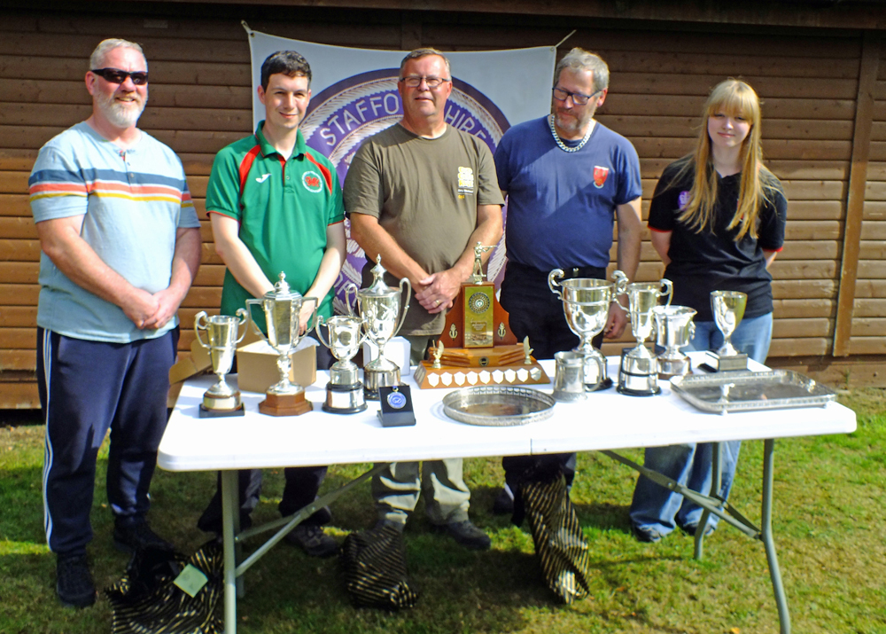Photograph shows members of Rugeley Rifle Club proudly displaying their superb haul of well earned trophies.